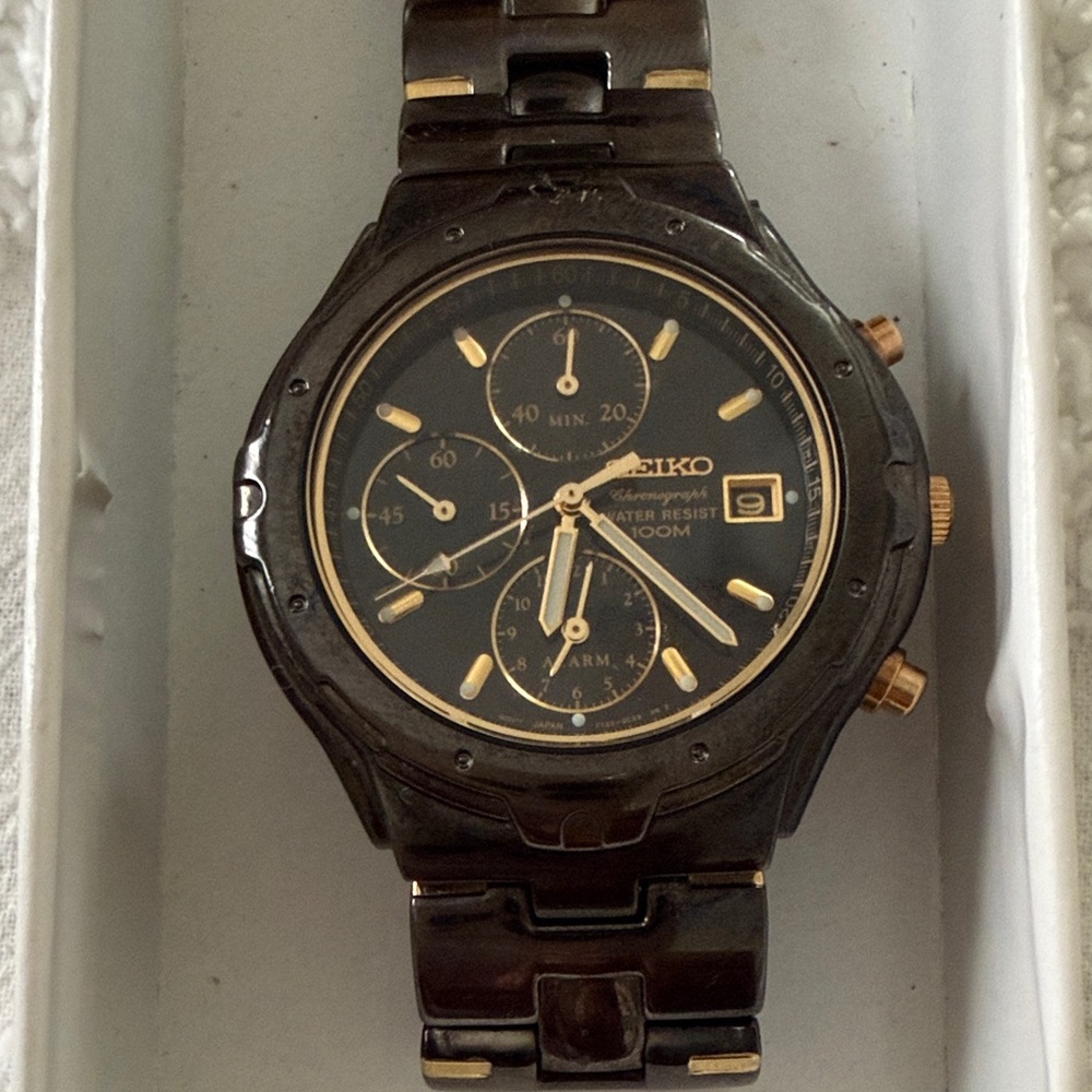 Seiko Black Dial Watch with Gold Accents